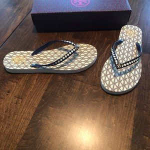 Tory Burch flip flops.